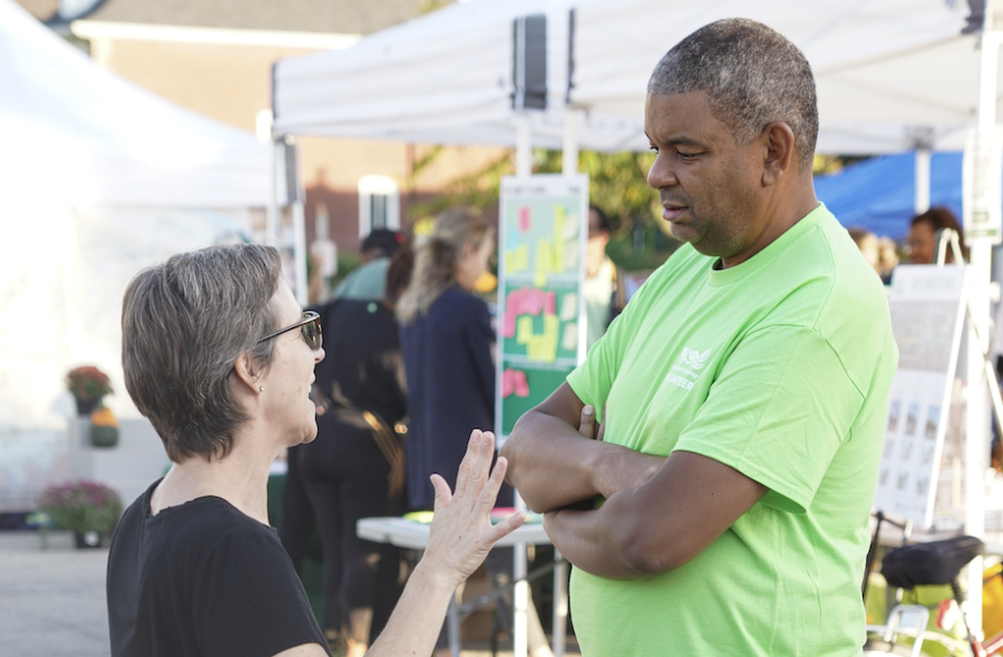 Cordell talking to lady