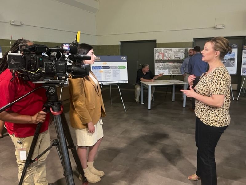 Lady in front of camera